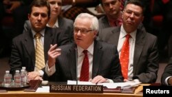 Ресейдің БҰҰ-дағы өкілі Виталий Чуркин (ортада) БҰҰ Қауіпсіздік кеңесінің Украинаға қатысты жиынында сөйлеп отыр. Нью-Йорк, 19 наурыз 2014 жыл.