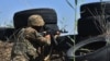 Armenia - An Armenian solider at an army outpost on the border with Azerbaijan, July 22, 2021.