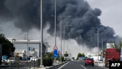 ირანის სარაკეტო შეტევით გამოწვეული აფეთქების კვამლი კატარის დედაქალაქ დოჰაში, სამრეწველო რაიონში. 2026 წლის 1 მარტი