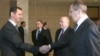 Syria -- President Bashar al-Assad (L), welcomes Russian Foreign Minister Sergei Lavrov to Damascus, 07Feb2012