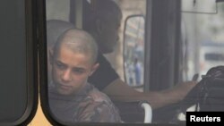 Russiýada tussag edilen migrant ýetginjek.