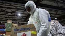 Разгрузка гуманитарной помощи из Китая в аэропорту Алматы. 2 апреля 2020 года.