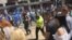 Serbia - Participants in the protests on International Labor Day in Belgrade who shout to Serbian Minister of Labor Zoran Djordjevic "Zoran, you thieve" are trying to reach him while he is leading the protest column. Belgrade, 1. May 2018.