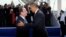U.S. President Barack Obama (right) talks with French President Francois Hollande during the international D-Day commemoration ceremony in Normandy on June 6.