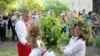 People dance in a circle during a celebration of Ivan Kupala Night in Khortytsya on June 21.&nbsp;
