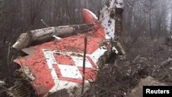 Poland -- Image from video footage shows part of the tail of a Polish government aircraft after it crashed near Smolensk airport in western Russia,