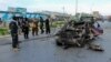 The scene of an explosion that targeted the vehicle of a local police commander in Kandahar on April 19. Taliban assaults on foreign troops have largely ceased since a February 2020 peace deal, but attacks have continued against Afghan security forces and government personnel.
