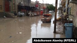مياه أمطار في شوارع البصرة
