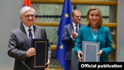 Belgium - EU foreign policy chief Federica Mogherini and Armenian Foreign Minister Edward Nalbandian sign the Armenia-EU Comprehensive and Enhanced Partnership Agreement in Brussels, 24Nov2017. 