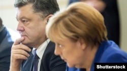 Ukrainian President Petro Poroshenko and German Chancellor Angela Merkel in Paris in October.