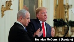 Presidenti amerikan, Donald Trump në konferencën e përbashkët me kryeministrin izraelit Benajmin Netanyahu. Shtëpia e Bardhë, 28 janar, 2020.