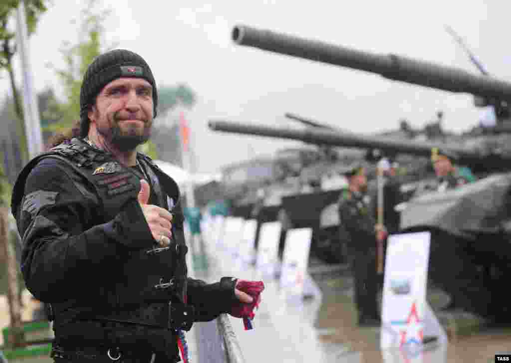 Night Wolves motorcycle club leader Aleksandr Zaldostanov gestures as he attends the Army-2015 International Military-Technical Forum in Kubinka, outside Moscow, on June 16. (TASS/Mikhail Pochuyev)