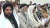 Members of a pro-Taliban delegation attend a meeting with Pakistani government officials in Peshawar on February 16