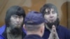 Anzor Gubashev and Zaur Dadayev sit in a Moscow court on July 13 as they are sentenced for the murder of Russian opposition politician Boris Nemtsov. 