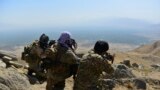 AFGHANISTAN -- Afghan resistance movement and anti-Taliban uprising forces take positions during a patrol on a hilltop in Darband area in Anaba district, Panjshir province, September 1, 2021