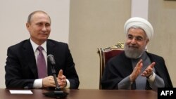 Владимир Путин и иранский лидер Хасан Рухани, архивное фото