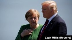 Presidenti amerikan, Donald Trump dhe kancalarja gjermane, Angela Merkel, foto nga arkivi.