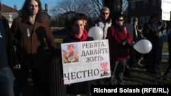 Demonstrators protest outside the Russian Embassy in Washington, D.C.