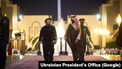 Ukrainian President Volodymyr Zelenskyy, center left, meets Saudi Crown Prince Muhammad bin Salman, center right, during his visit to Jeddah on Monday, March 10, 2025.