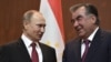 Russian President Vladimir Putin and Tajik President Emomali Rahmon attend a signing ceremony following their talks in Dushanbe on February 27.