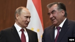 Russian President Vladimir Putin (left) and Tajik President Emomali Rahmon following their talks in Dushanbe on February 27. 