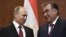 Russian President Vladimir Putin (left) and Tajik President Emomali Rahmon following their talks in Dushanbe on February 27. 