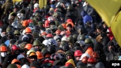 Үкіметке наразылық танытушылар Тәуелсіздік алаңында тұр. Киев, 29 қаңтар 2014 жыл.