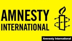 Amnesty International халықаралық ұйымының логотипі (Көрнекі сурет).