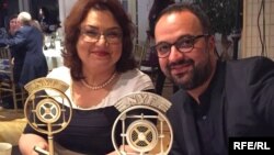 Radio Farda's Roya Karimi Majd and Kambiz Hosseini win trophies at the 2015 New York Festivals, June 22, 2015. 