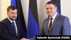 სეპარატისტების ლიდერები დენის პუშილინი და ლეონიდ პასეჩნიკი