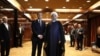 France's president Emmanuel Macron (L) greets Iranian president Hassan Rouhani at the Millennium Hotel near the United Nations on September 18, 2017, in New York.