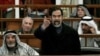 Hussein Shouts At Judge As Trial Resumes