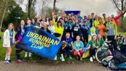 Учасники марафону в Амстердамі, 13 жовтня 2024 року