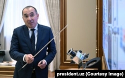 A February presentation that shows a model of an Uzbek satellite.