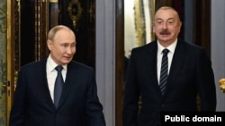 Орусиянын президенти Владимир Путин жана Азербайжандын президенти Илхам Алиев.