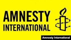 Amnesty International logo in English