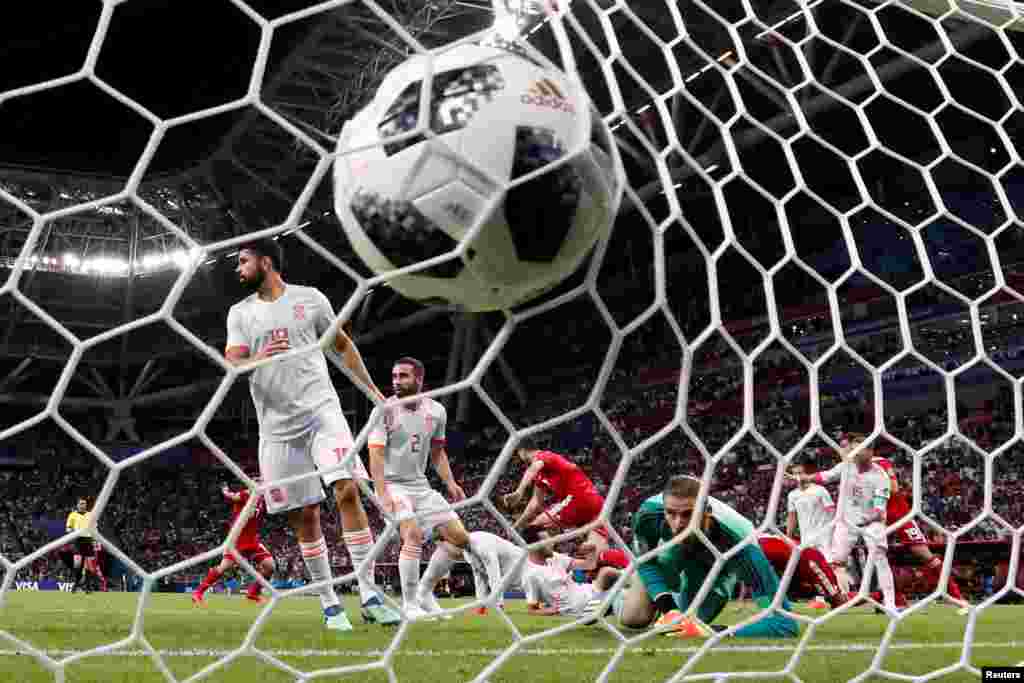 Soccer Football - World Cup - Group B - Iran vs Spain - Kazan Arena, Kazan, Russia - June 20, 2018 Iran's Saeid Ezatolahi celebrates scoring their first goal with team mates before it was disallowed after a VAR review REUTERS/Toru Hanai