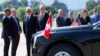 U.S. President Joe Biden, Swiss Federal President Guy Parmelin, and delegation members gather after Biden's arrival at the airport in Geneva, Switzerland, on June 15.