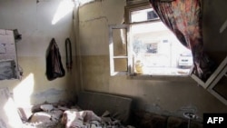 Homsda hökümet güýçleri tarapyndan weýran edilendigi aýdylýan jaý, 9-njy fewralda.