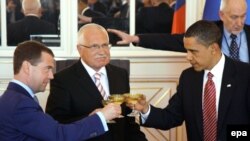 Russian President Dmitry Medvedev (left), Czech President Vaclav Klaus (center) and U.S. President Barack Obama toast in Prague last April, after the START treaty was signed.