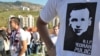 Bosnians attend the funeral of Vedran Puljic, a Sarajevo soccer fan who was killed in clashes with rival fans and police.