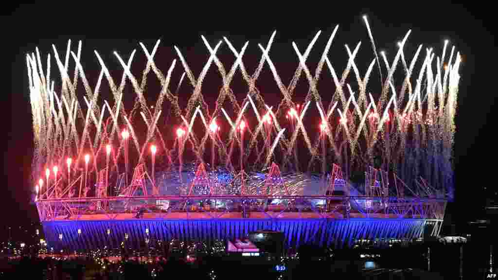 Fireworks light up the Olympic Stadium during the opening ceremonies of the London 2012 Games in the early mornings hours of July 28. (AFP/Indranil Mukherjee)