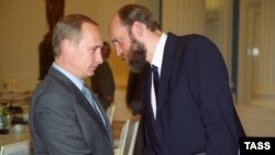 Vladimir Putin və Sergei Pugachev