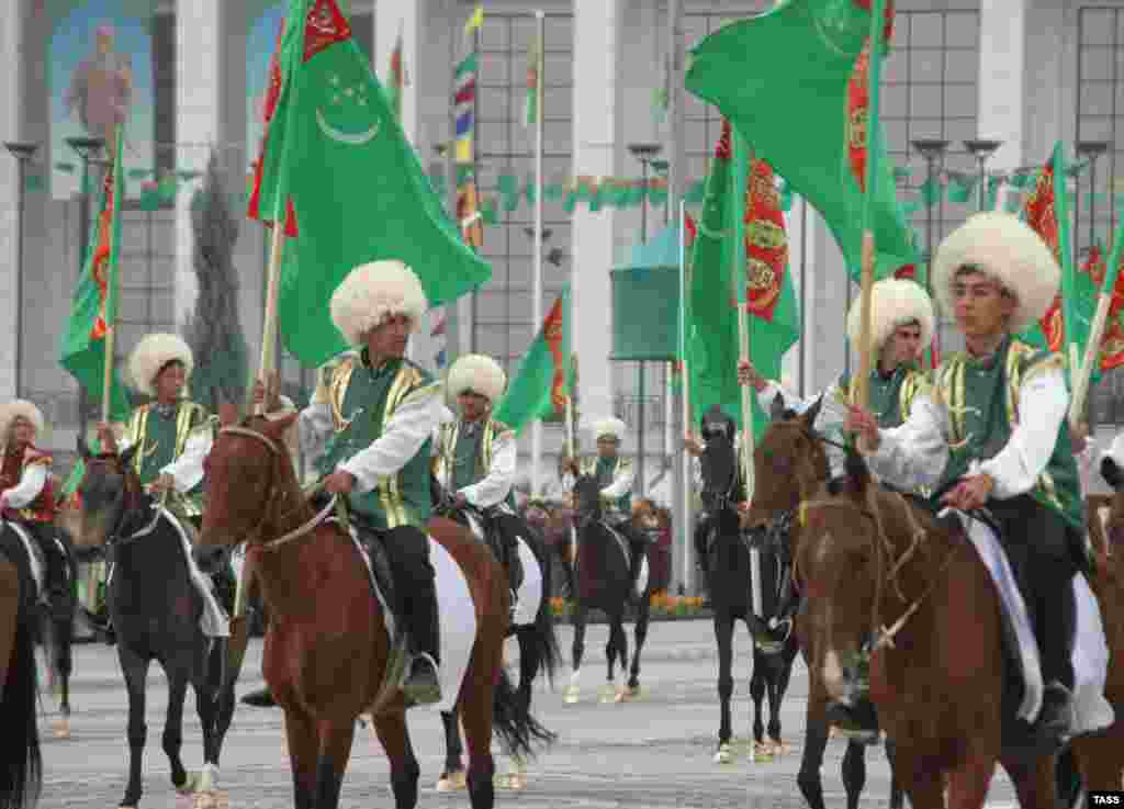 The Turkmen cavalry at a military parade to mark 15th anniversary of the country's independence (TASS) - Turkmenistan celebrated 15 years of independence in October, but the difference between independence and freedom was made clear by numerous reports of the repression of dissidents and the political, economic, and social freedoms of ordinary Turkmens. For RFE/RL, the difference was made tragically clear when correspondent Ogulsapar Muradova died in custody under murky circumstances.