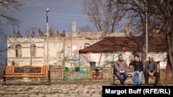 Azerbaijan - men sit in a square in the town of Shusha, Nagorno-Karabakh, 25 March 2014.