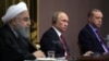 Iranian President Hassan Rohani (left) Russian President Vladimir Putin (center), and Turkish President Recep Tayyip Erdogan address the media after a trilateral meeting on Syria in Sochi, November 22, 2017