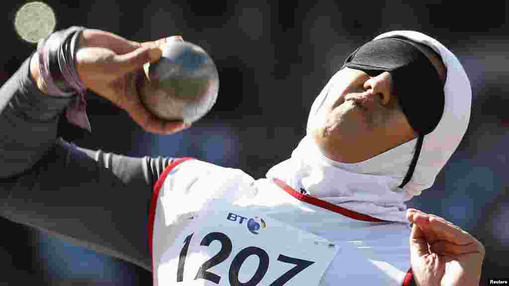 Iran's Hajar Taktaz competes in the women's shot put at the London Paralympics in September. (Reuters/Suzanne Plunkett)