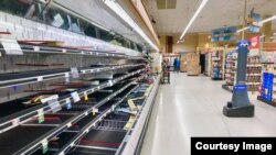 20 марта, полки одного из супермаркетов в Нью-Йорке