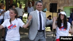 Armenia - Prime Minister Tigran Sarkisian dances with Syrian Armenian children at a summer camp in Hankavan, 13Aug2012.