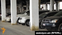 Armenia -- Imported cars in tax terminal, undated.